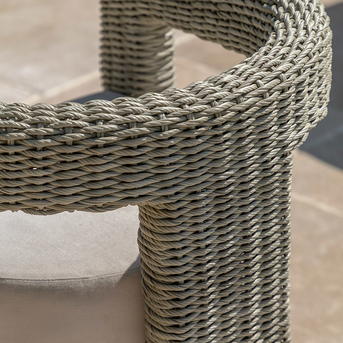 close up image of round back of wicker garden dining chair