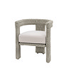 image cut out on white background of round backed wicker dining chair with plush cream cushion