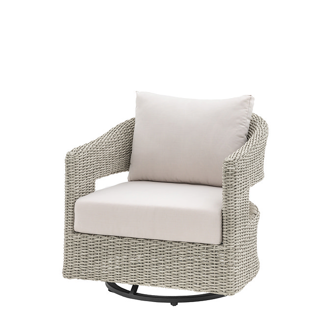 cut out of wicker garden chair with swivel base and plush cream cushion