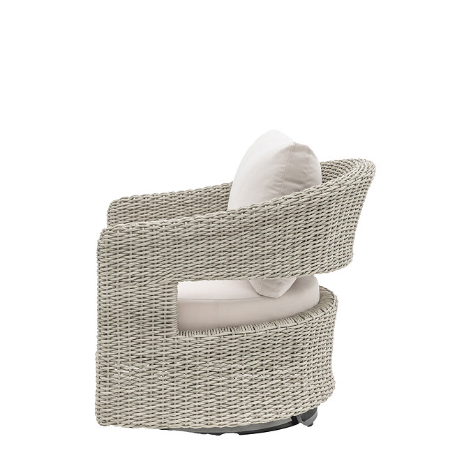 side on cut out of wicker garden chair with rounded shape and middle cut out
