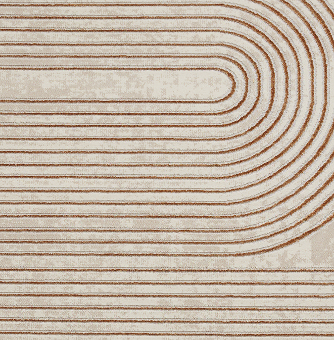 close up on bronze lined pattern of rectangular rug