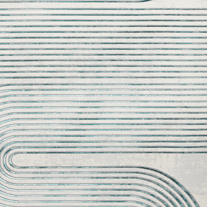 close up on green pattern of grey-green rug, highlighting thin weave lines