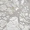 close up image on grey/gold rug with marbled texture