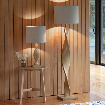 image of tall floor lamp with twisted wooden body and linen shade
