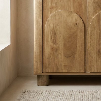 close up image of mango wood effect on sideboard