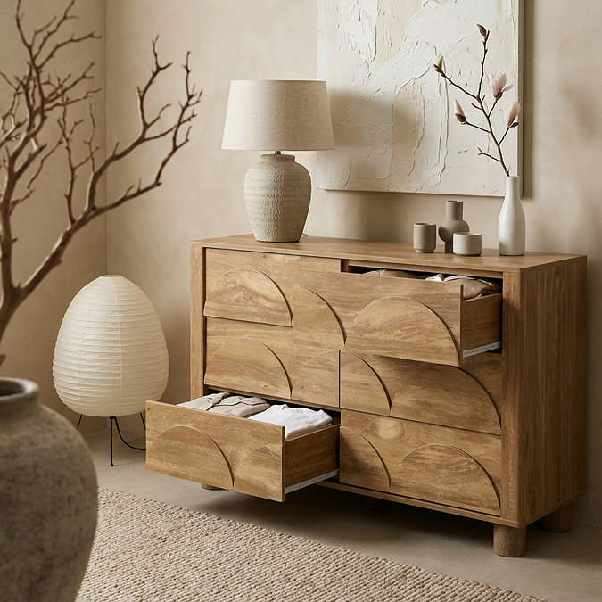 side on image of mango wood effect arch six drawer chest