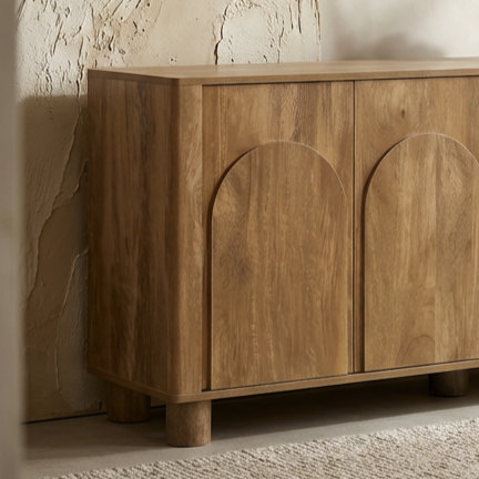 close up image of mango wood effect closed four door sideboard