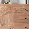 close up image of acacia wood material of sideboard