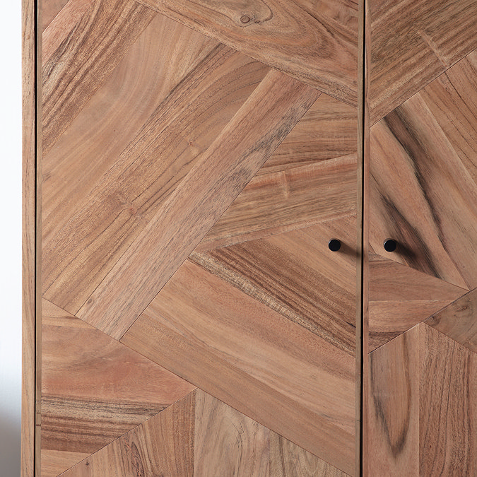 close up image of acacia wood material of drinks cabinet with small black iron handles