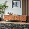 image of short and wide acacia wood tv unit with black iron handles, against a wall