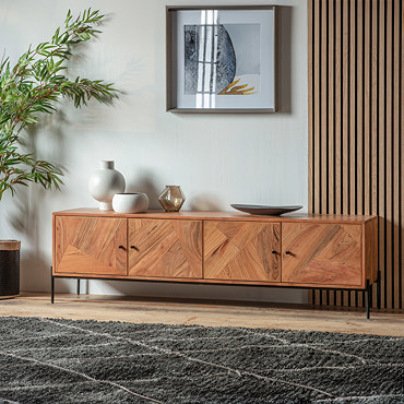 close up image on acacia wood construction of tv unit with black iron legs and handles