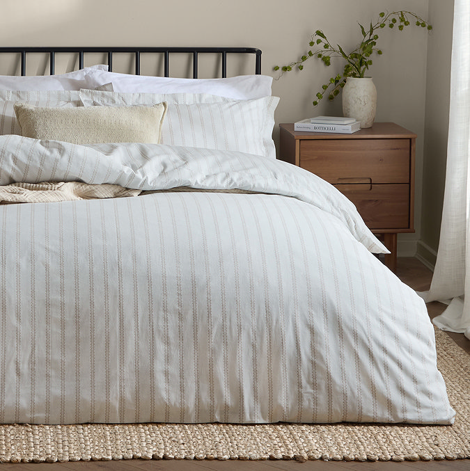 Arlen Mocha duvet cover on bed image 2