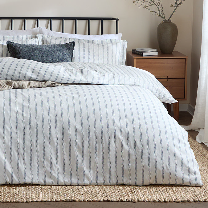 Arlen Navy on bed image  3