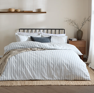 Arlen navy on bed image 1