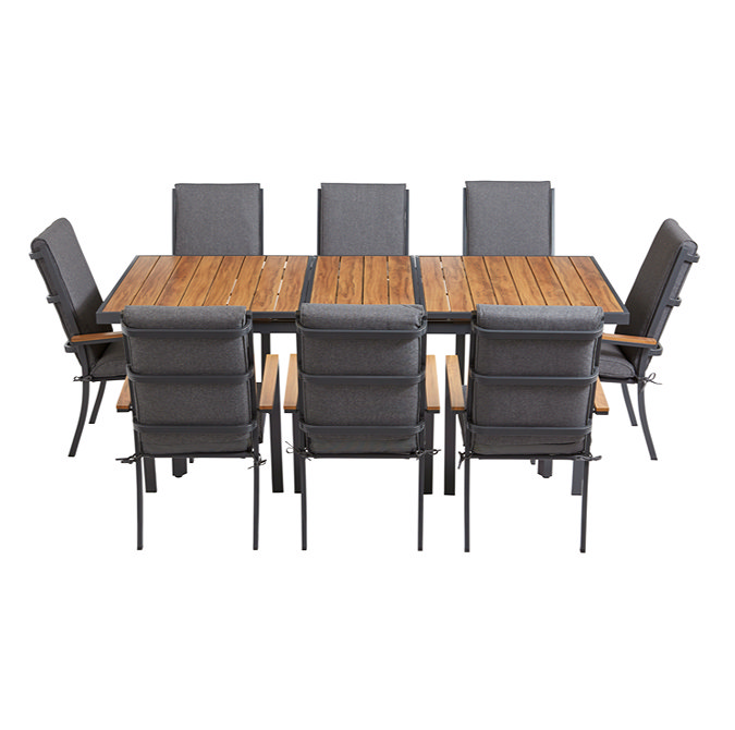image cut out on white background of black and teak wood garden dining table with eight matching chairs tucked in around it
