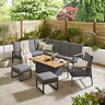 image of grey corner lounge set with teak arms, matching chair and two stools, around a rectangular coffee table with lifting slatted tabletop