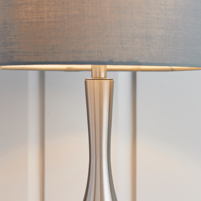 image of middle of grey lamp where shade meets slim silver body