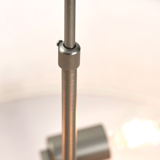 close up image of bronze-effect pendant of ceiling light