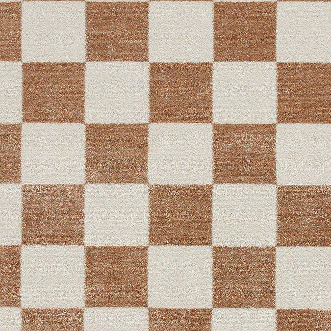 close up on colour and texture of cream and walnut brown checkered rug