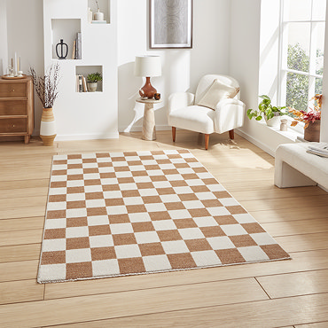 angled image of light brown and cream checkerboard rug on light wooden floor of modern loft apartment