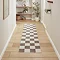 image of grey and cream checkered runner in hallway