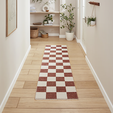 image cut out on white background of plum and cream checkered runner
