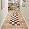 image of plum and cream checkered runner in hallway
