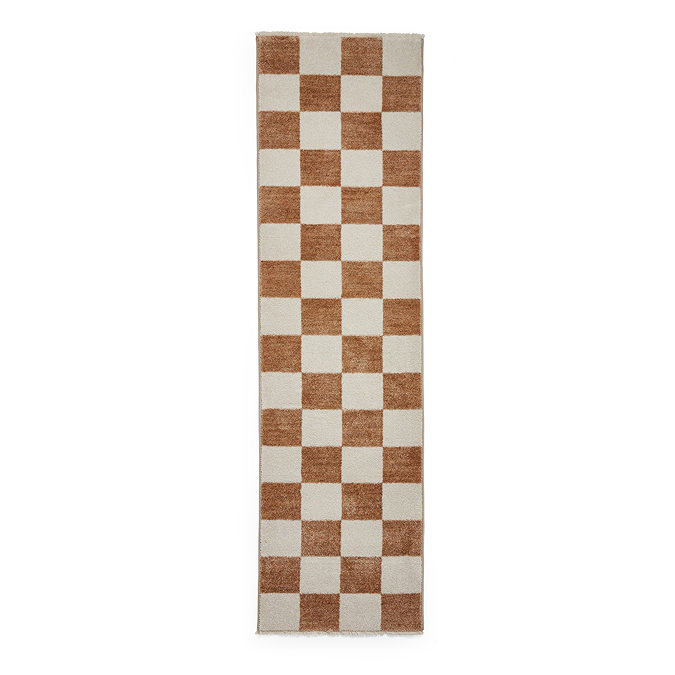 image cut out on white background of light brown and cream rectangle runner