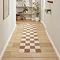 image of light brown and cream checkered runner in hallway