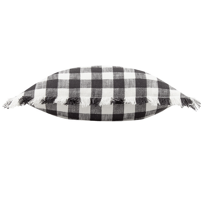 image cut out on white background of black and white checkered cushion on its side to show its plushness