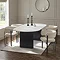 image of four cream chenille dining chairs round cream and black matching dining table