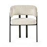 image cut out on white background of cream chenille chair with black legs