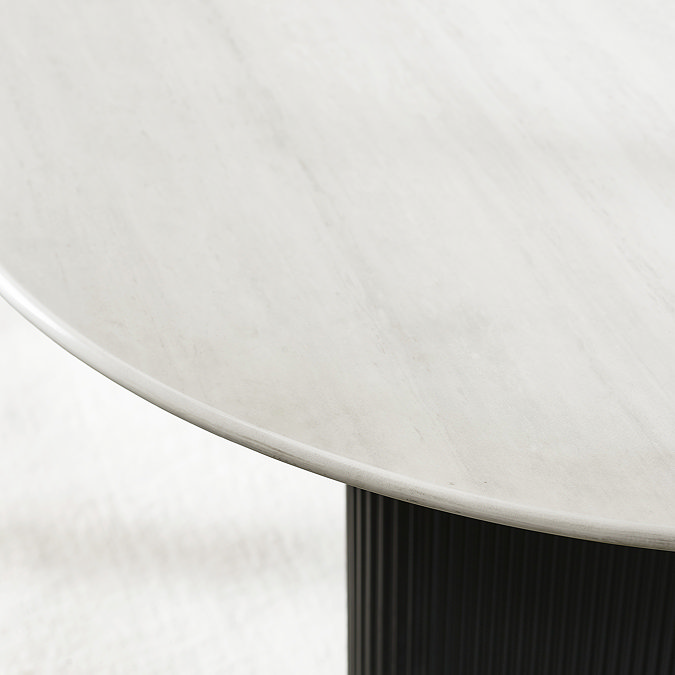 close up image on white marble effect top of dining room