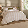 Birdie stripe oat and milk duvet cover set on bed image 1