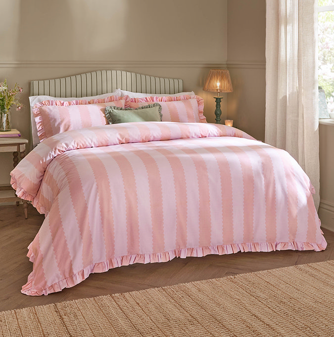 Pink and Raspberry birdie on bed image 1