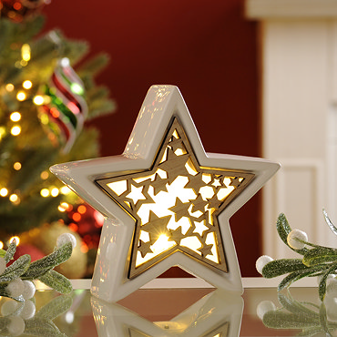 penny lit wooden star