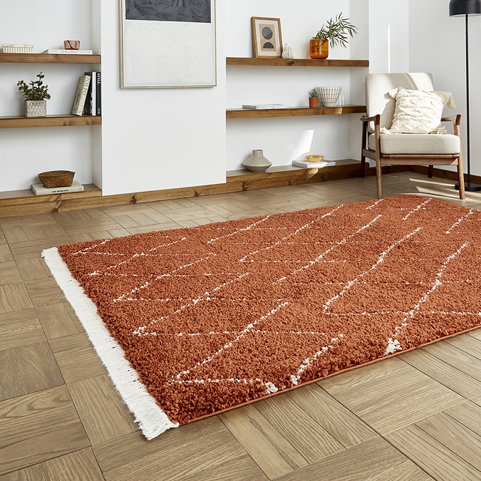 Boho rug in rust on floor image 2