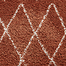 Boho rug in rust close up image 6