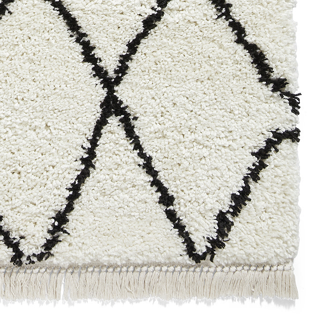 white and black boho rug close up image 5