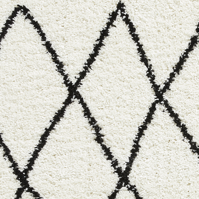 white and black boho rug close up image 6
