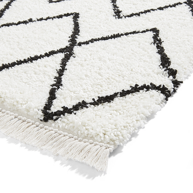 white and black boho rug close up image 7