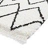 white and black boho rug close up image 7