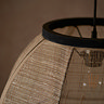 close up on circular top of light shade with black rim