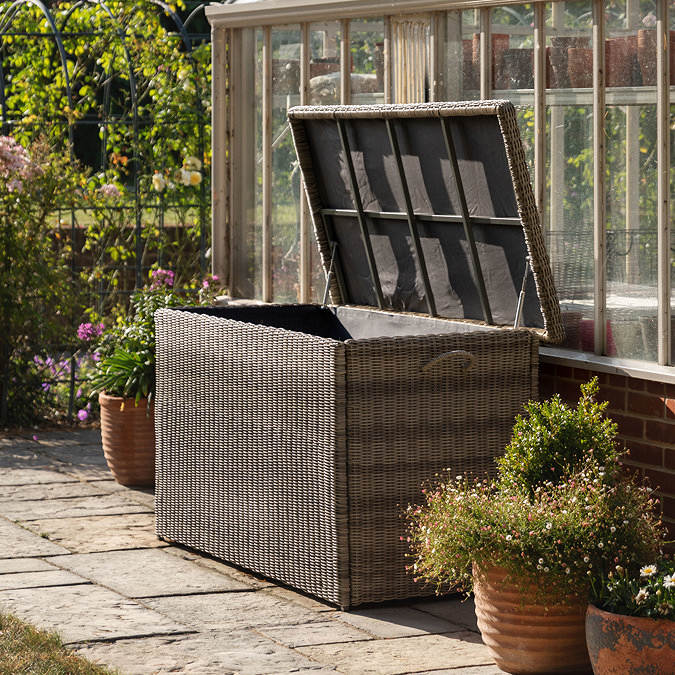 image of large rattan storage box with lid propped open