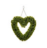 image cut out on white background of heart shaped green wreath with chain