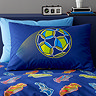 close up image of navy pillowcase with bright football printed on its centre