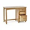 image cut out on white background of solid oak single dressing table with three drawers on right hand side, bottom and middle ones pulled out slightly to suggest ample storage space inside