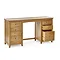 image cut out on white background of solid oak dressing table with six drawers, bottom right one open to indicate storage space