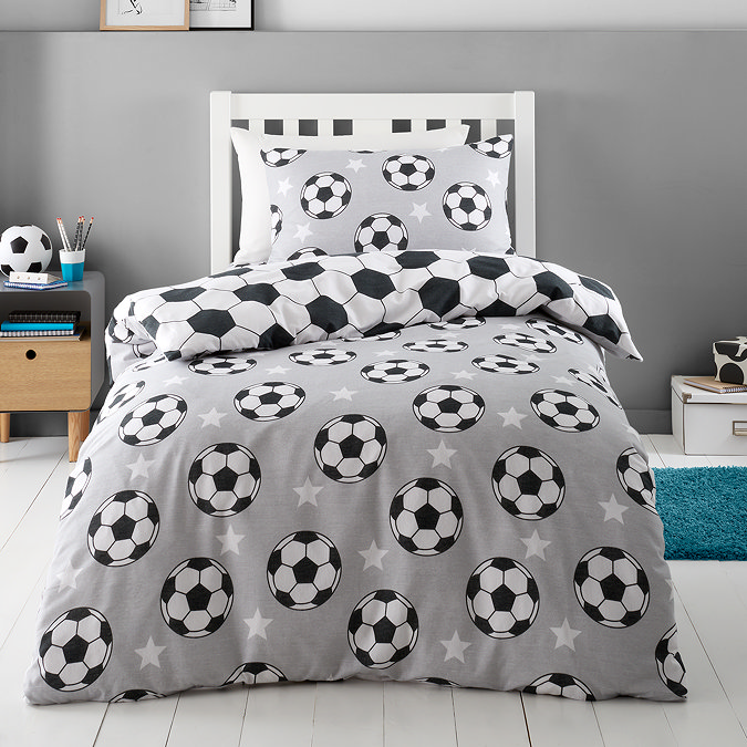 brushed football stars on bed image 1
