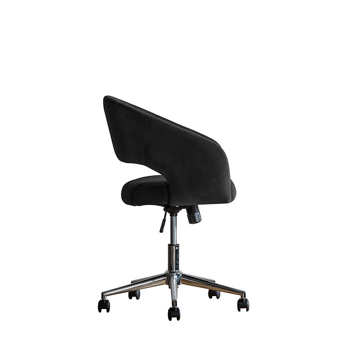 side on cut out image of black velvet swivel chair with silver base